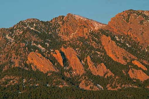 Winter landscape of the Flatirons at sunrise, Front Range, Rocky Mountains, Boulder, Colorado, USA