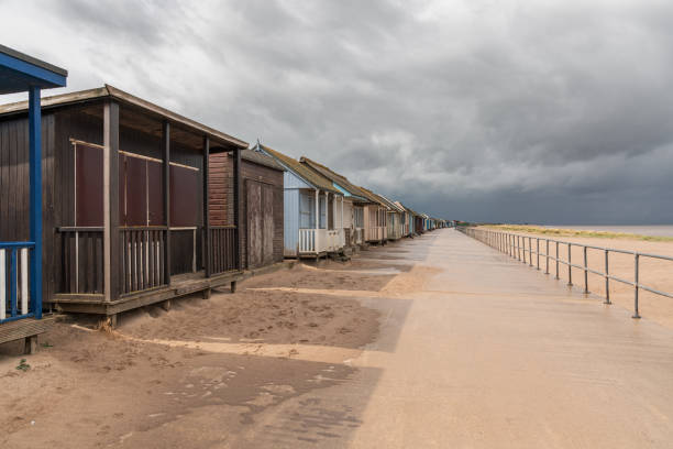 istock Beach Huts in Sandilands, Lincolnshire, England 1291032404