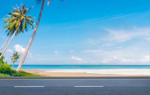 istock Beautiful beaches road and coconut trees in Thailand. 1291033151