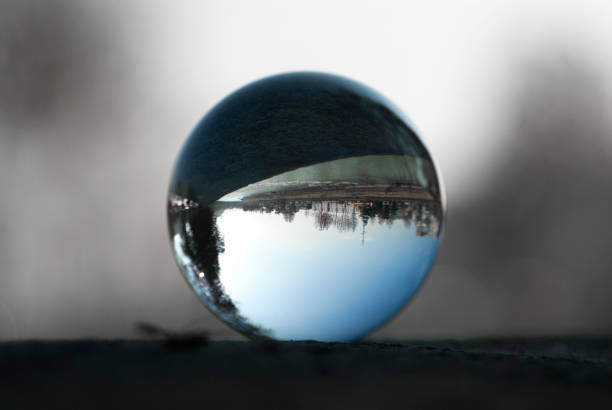 istock A riverside highway view through a lens ball. Glass ball with inverted view. 1291035183