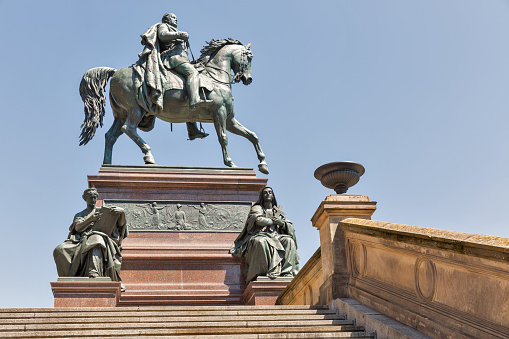 Berlin, Germany - July 14, 2018: Equestrian statue of King Frederick William in front of the Old National Gallery in Berlin, Germany.