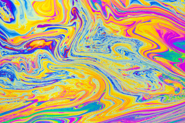 istock Psychedelic multicolored patterns background. Photo macro shot of soap bubbles 1291041746