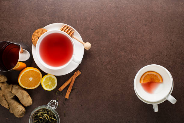 istock Winter hot tea cup with ginger and lemon 1291043340