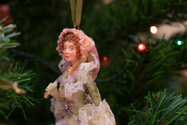istock christmas tree toy girl on the tree 1291044436