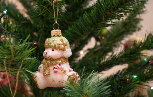 istock decorating the Christmas tree with toys at home 1291044439