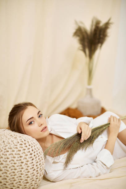 istock young sensual woman in studio interior 1291044528