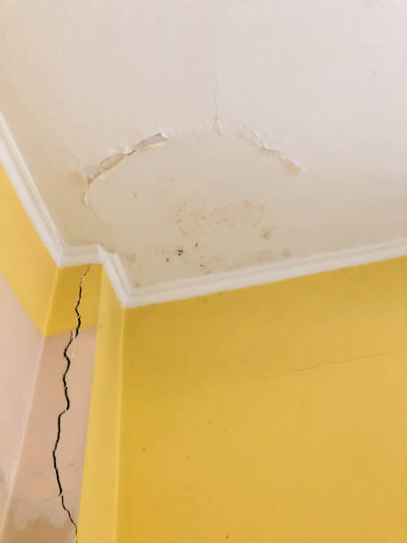 istock damaged ceiling and column of a room needs to be repaired 1291044623