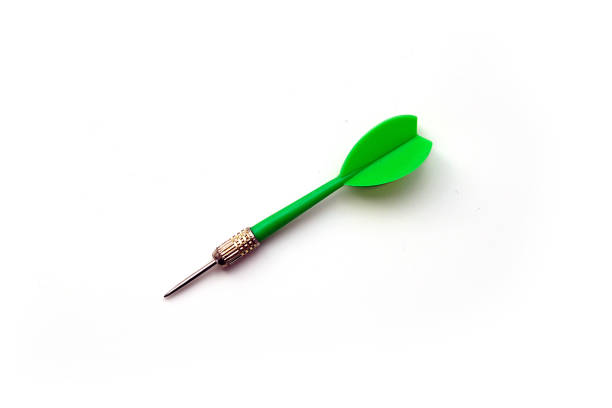 istock Yellow, green and red darts on a white background, close-up, 1291045507