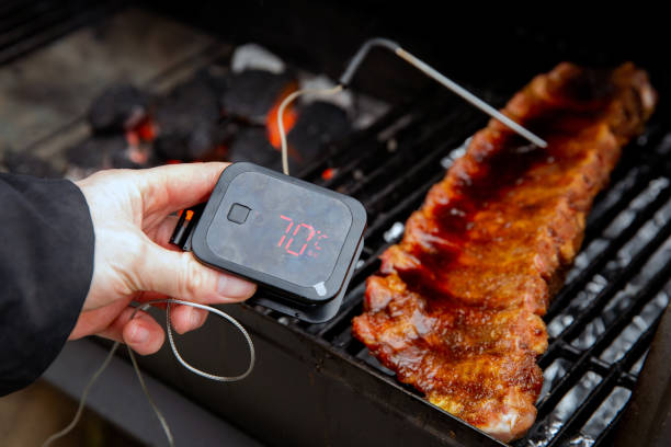 Digital Thermometer BBQ, grill, barbecue for beaf steak and spare rib ant other meat. measuring temperature stock photo
