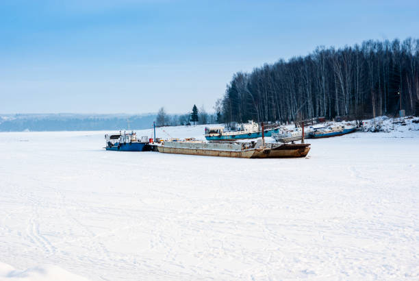 istock Perm, Russia - Dec, 13: Rusty ships at the shipyard 1291047036