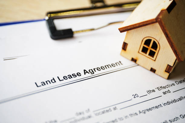 legal document land lease agreement on paper close up - employ imagens e fotografias de stock