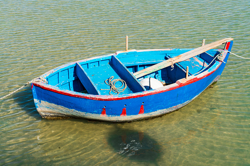 rowboat in the harbor of Molfetta, Apulia, Italy