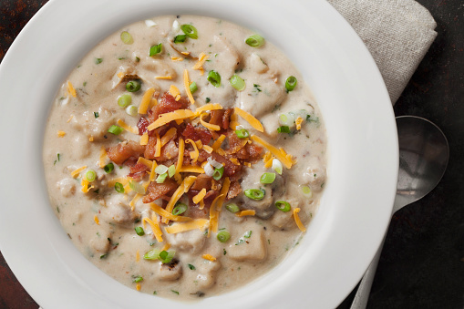 Creamy Baked Potato Soup with Cheddar Cheese, Green Onions and Crispy Bacon