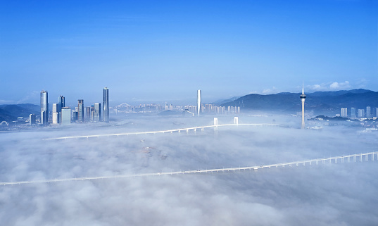 Drone point view of Macao panoramic cityscape at morning in stratosphere cloud, Macau, China.