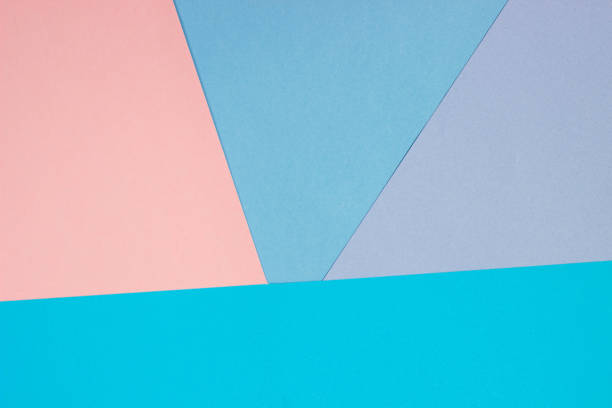 istock Abstract geometric flat background from colored paper. Pink and blue colored paper, a template for adding text. 1291052422