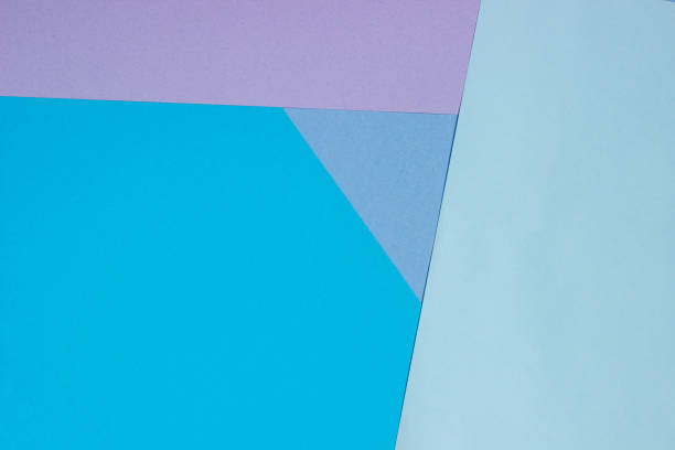 istock Abstract geometric flat background from colored paper. Violet and blue colored paper, template for adding text. 1291052423