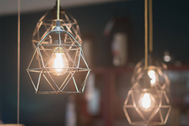 istock Close up Glowing light bulbs in the loft style. 1291052824
