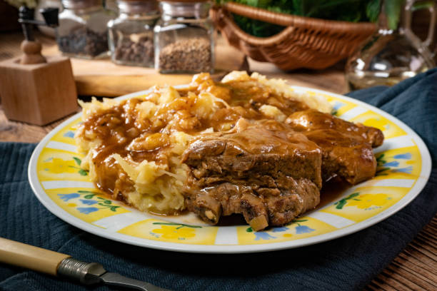 istock Delicious pork ribs stewed in gravy. 1291060558