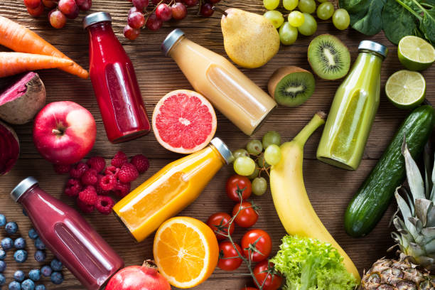istock Colorful smoothies in bottles 1291063815
