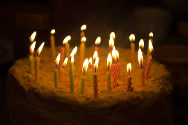istock Birthday cake with candles 1291066301