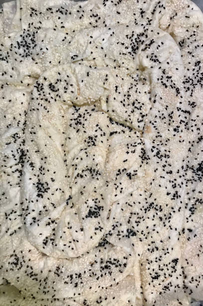 istock black cumin with sesame seeds on homemade uncooked pie 1291067643