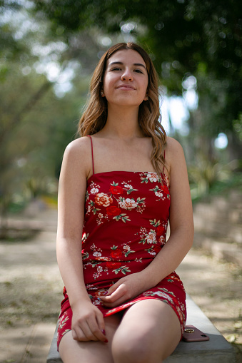 Portrait of a young woman in the park