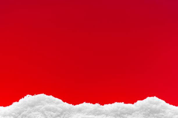 istock Festive red Christmas background with white snowflakes 1291071895