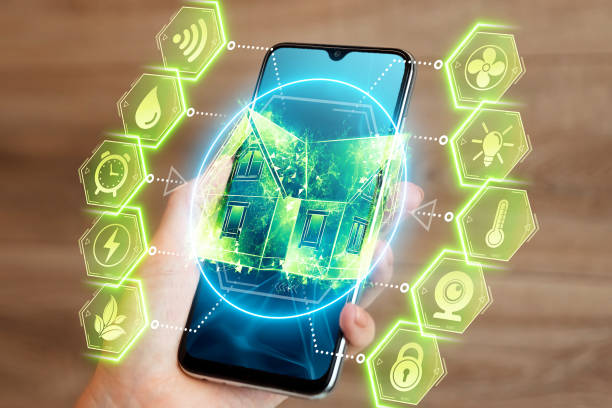 istock Smartphone and smart home interface hologram. Mixed environment. Automation concept, modern house, new technologies. 1291072751