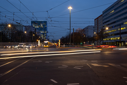 Night view from berlin traffic moving around and leaving light trails