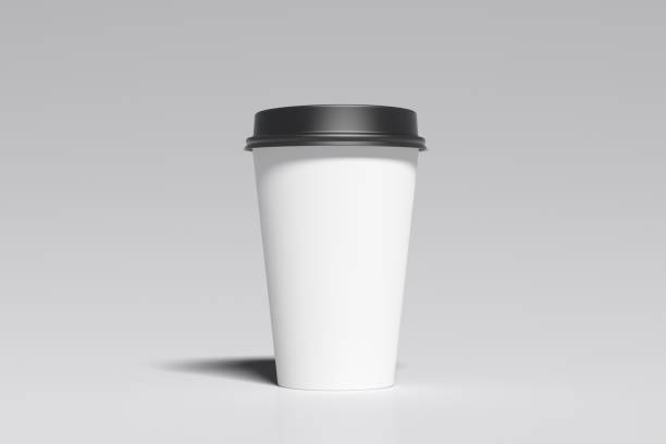 istock White take away coffee paper cup mock up with black lid on white background. 1291078764