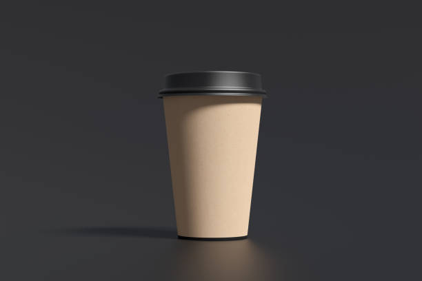 istock Cardboard take away coffee paper cup mock up with black lid on black background. 1291078771