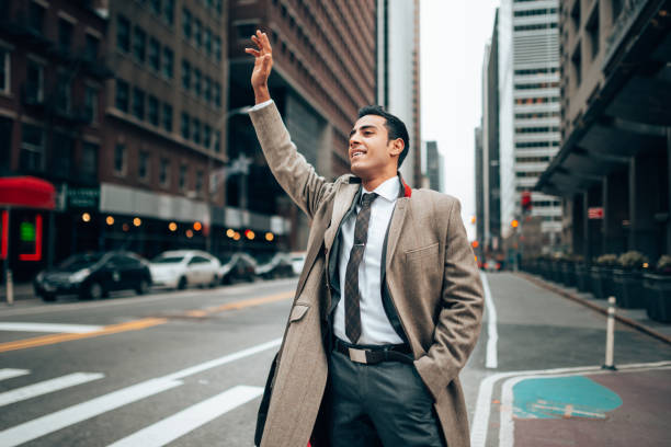 istock businessman calling the taxi 1291087542