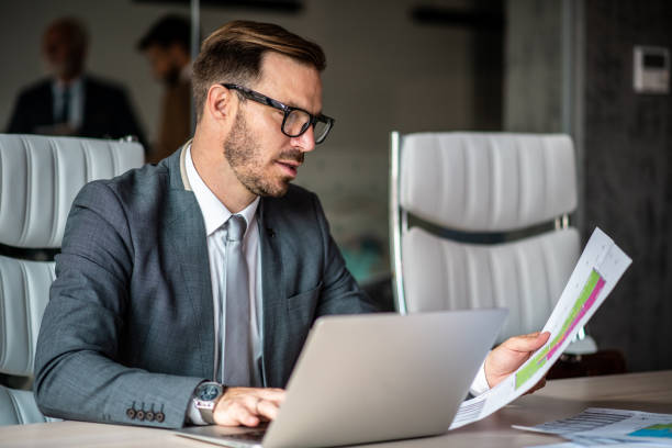 istock Junior businessman looking for new business strategy. 1291090778