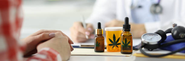 Doctor writes prescription for patient for marijuana. Doctor writes prescription for patient for marijuana. Legalization of marijuana concept medical cannabis stock pictures, royalty-free photos & images