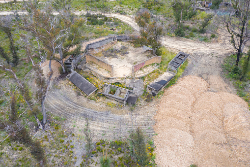 Aerial photograph of structural ruins and forest regeneration after bushfires near Clarence in the Central Tablelands in regional New South Wales in Australia