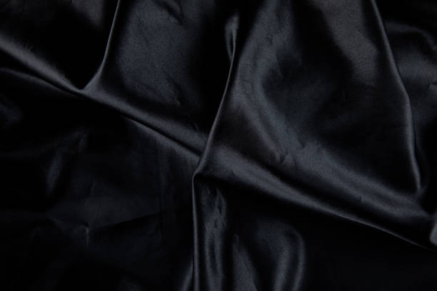 istock piece of black satin background 1291094096