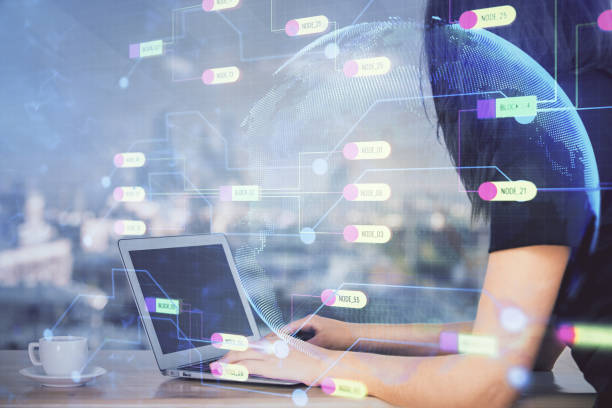 istock Multi exposure of woman hands working on computer and data theme hologram drawing. Tech concept. 1291095898
