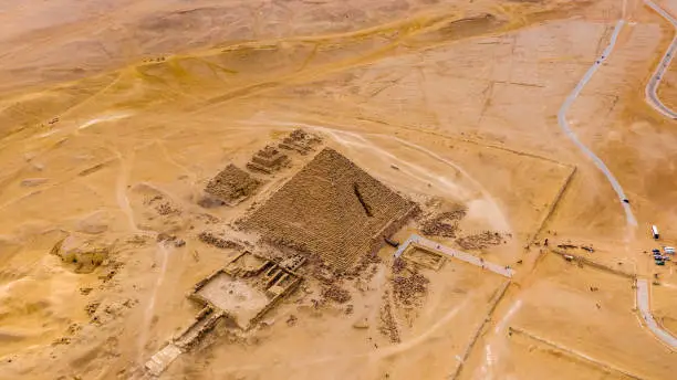 Aerial view of Pyramid of Menkaure, Giza pyramids landscape. historical egypt pyramids shot by drone