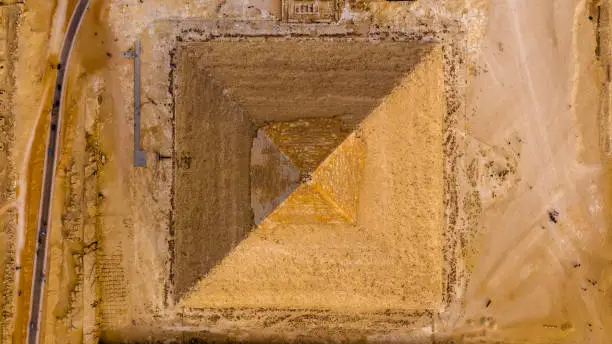 Aerial Vertical view of the pyramid of King Khafre, Giza pyramids landscape. historical egypt pyramids shot by drone.