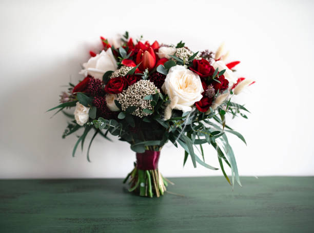 istock Large beautiful wedding bouquet with red and white roses 1291098827