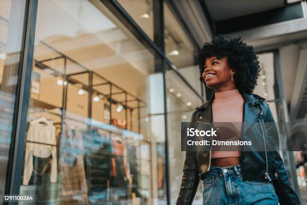 A Young Woman Out Shopping In The City Stock Photo - Download Image Now - Retail, Shopping, Shopping Mall