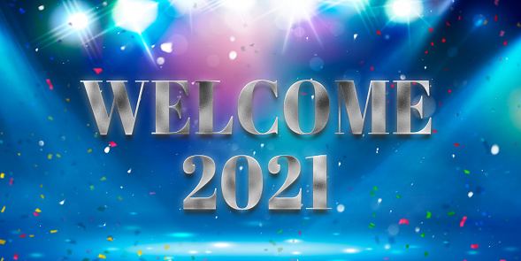 message WELCOME 2021 in front of colorful particle background