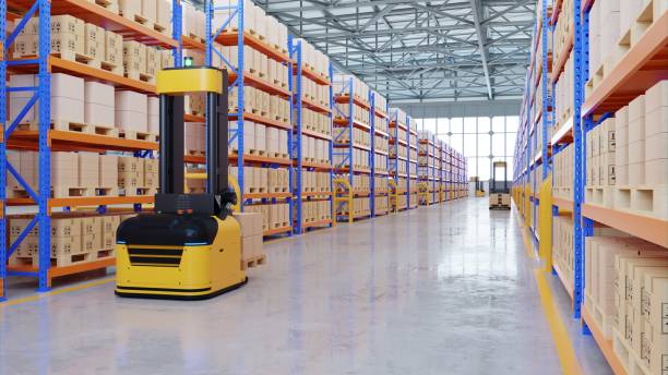AGV Forklift Trucks-Transport More with Safety in warehouse. AGV Forklift Trucks-Transport More with Safety in warehouse,3D rendering distribution warehouse stock pictures, royalty-free photos & images