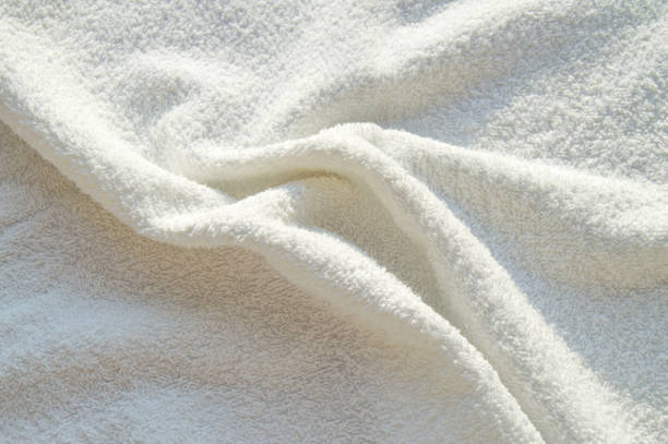istock White Terry bath towel, texture with pleats, background 1291101662