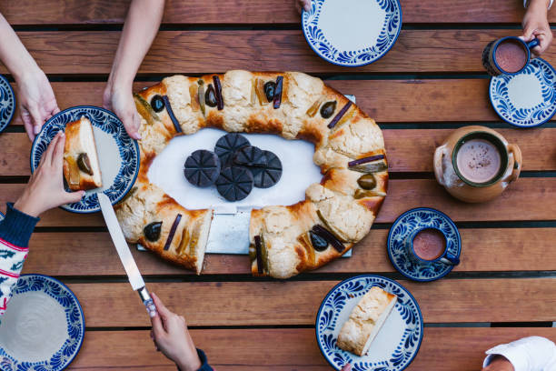 istock Rosca de reyes or Epiphany cake, Roscon de reyes with traditional mexican chocolate cup 1291103643