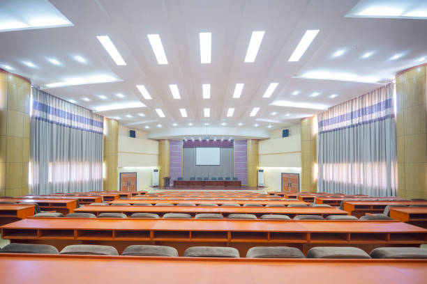 istock Large Modern University Lecture Hall Seats 1291103927