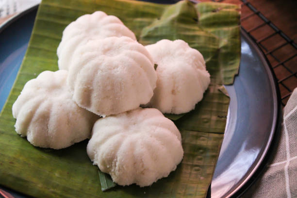 istock Kueh or Kuih Putu Perak on banana leaf 1291104722
