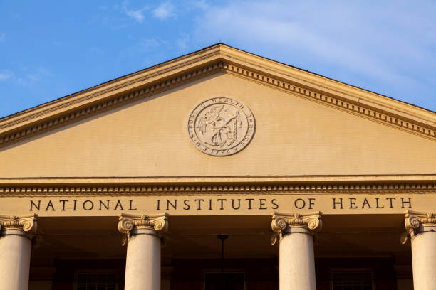 Exterior view of the main historic building (Building 1) of National Institutes of Health (NIH) inside Bethesda campus Bethesda, MD, USA 11/21/2020: Exterior view of the main historic building (Building 1) of National Institutes of Health (NIH) inside Bethesda campus. NIH funds majority of biomedical research in USA historic building photos stock pictures, royalty-free photos & images