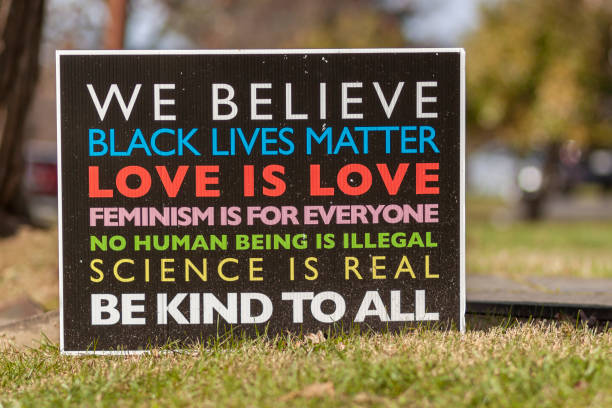 Rockville, MD, USA 11/22/2020: a manifesto on a yard sign with elements of progressive agenda such as humanism, anti racism, pro immigration, pro gay rights, equality, woman rights, and rationalism.