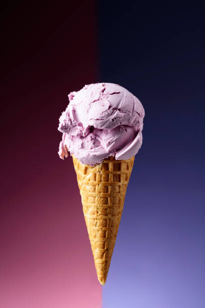 istock Blueberry ice cream in waffle cone. 1291110354